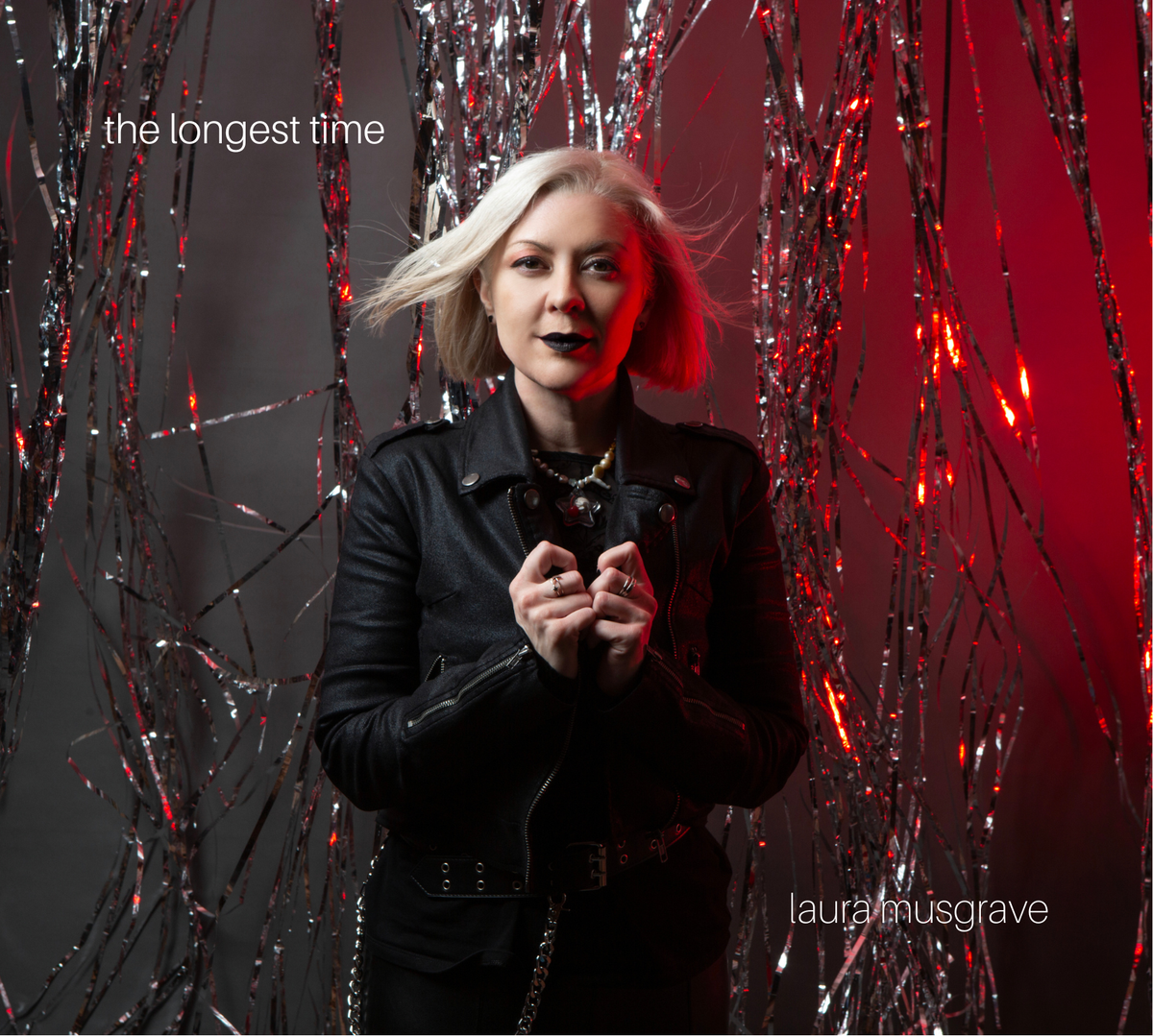 Album cover for 'the longest time' by Laura Musgrave, featuring the artist in a black leather jacket against a dark background with red lighting and silver tinsel.